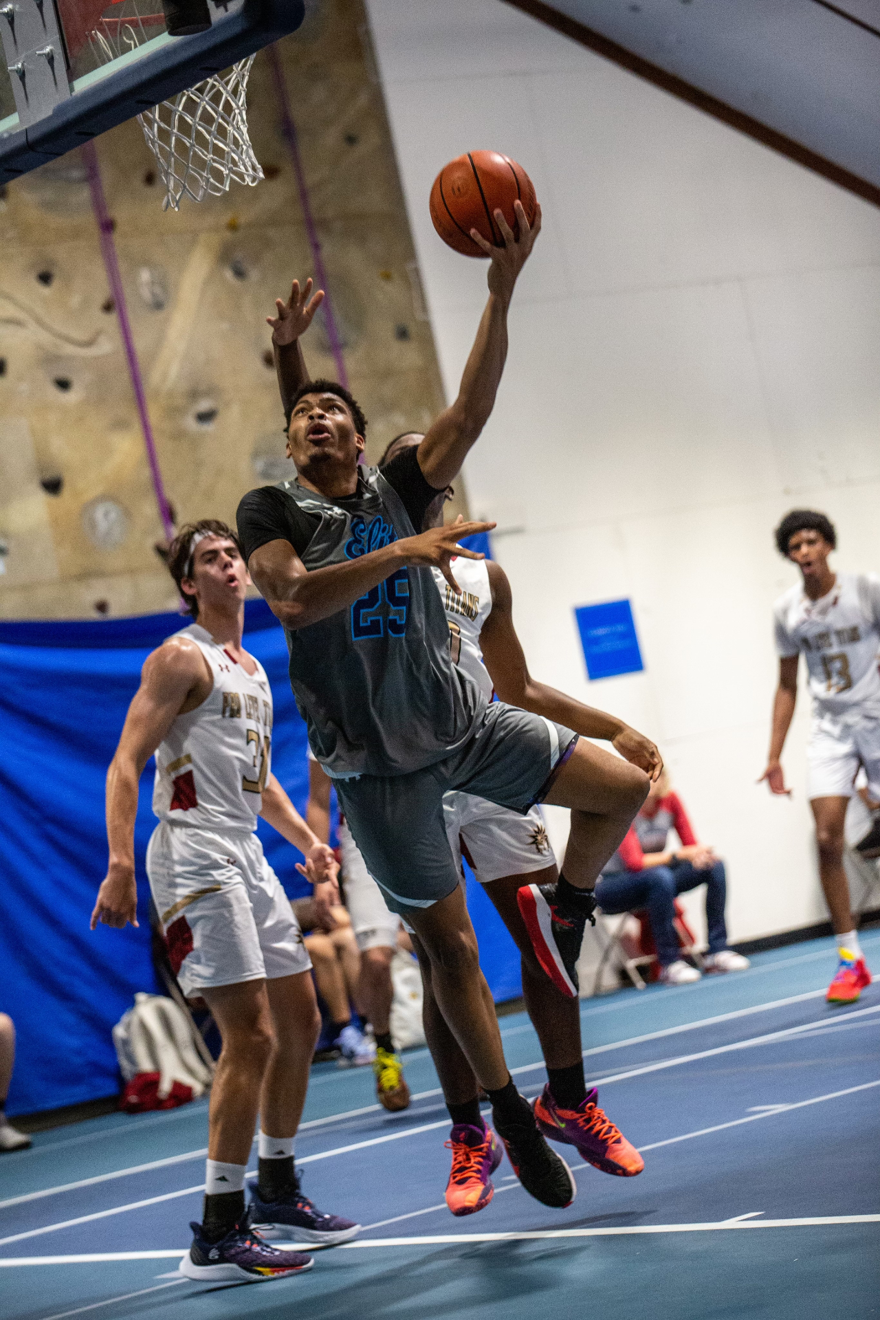 National Team player driving to the basket for a layup