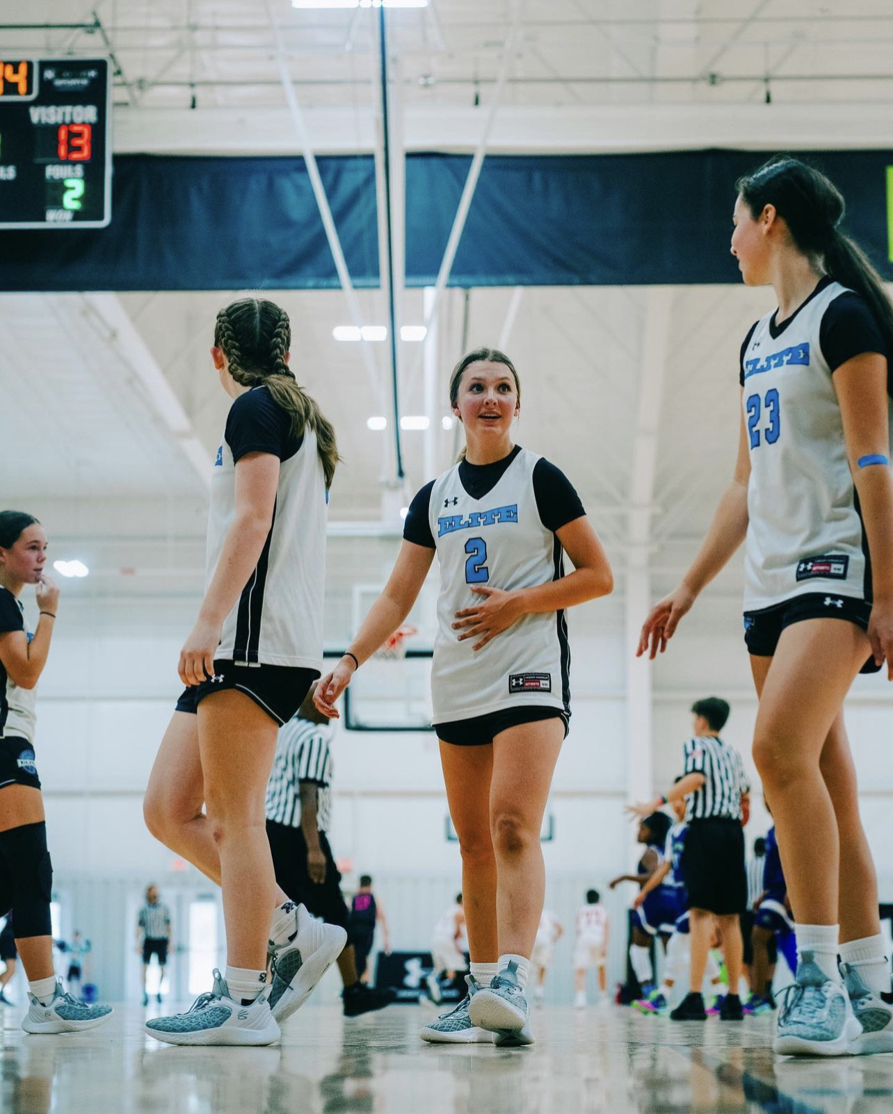 Connecticut Elite girls team on the court between plays
